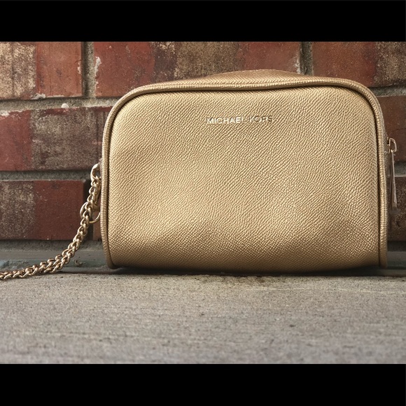Michael Kors Handbags - Michael Kors gold cosmetic bag